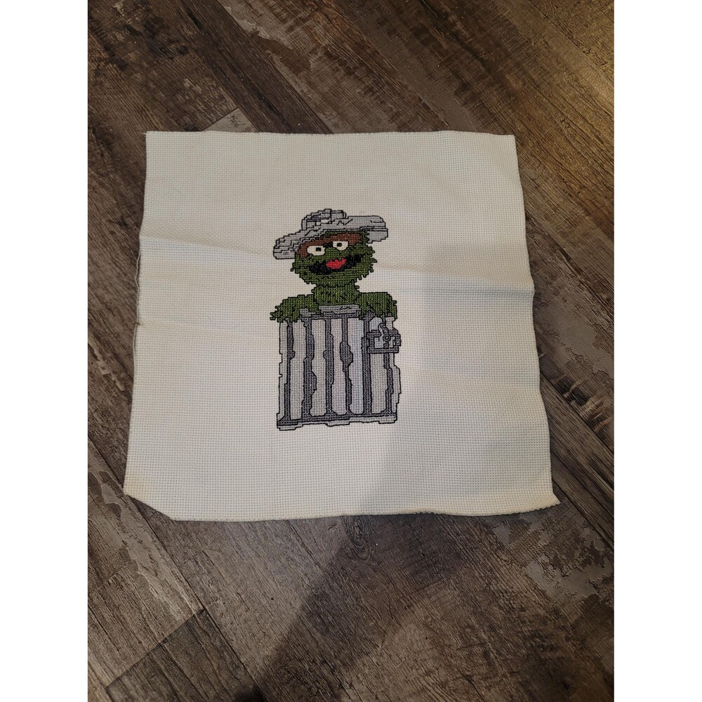 Cross-stitch of Oscar The Grouch 12x12 unframed